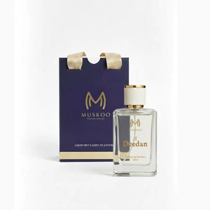 Muskoo Deedan 50ml Extrait de Parfum with gold and white cap and navy luxury gift bag