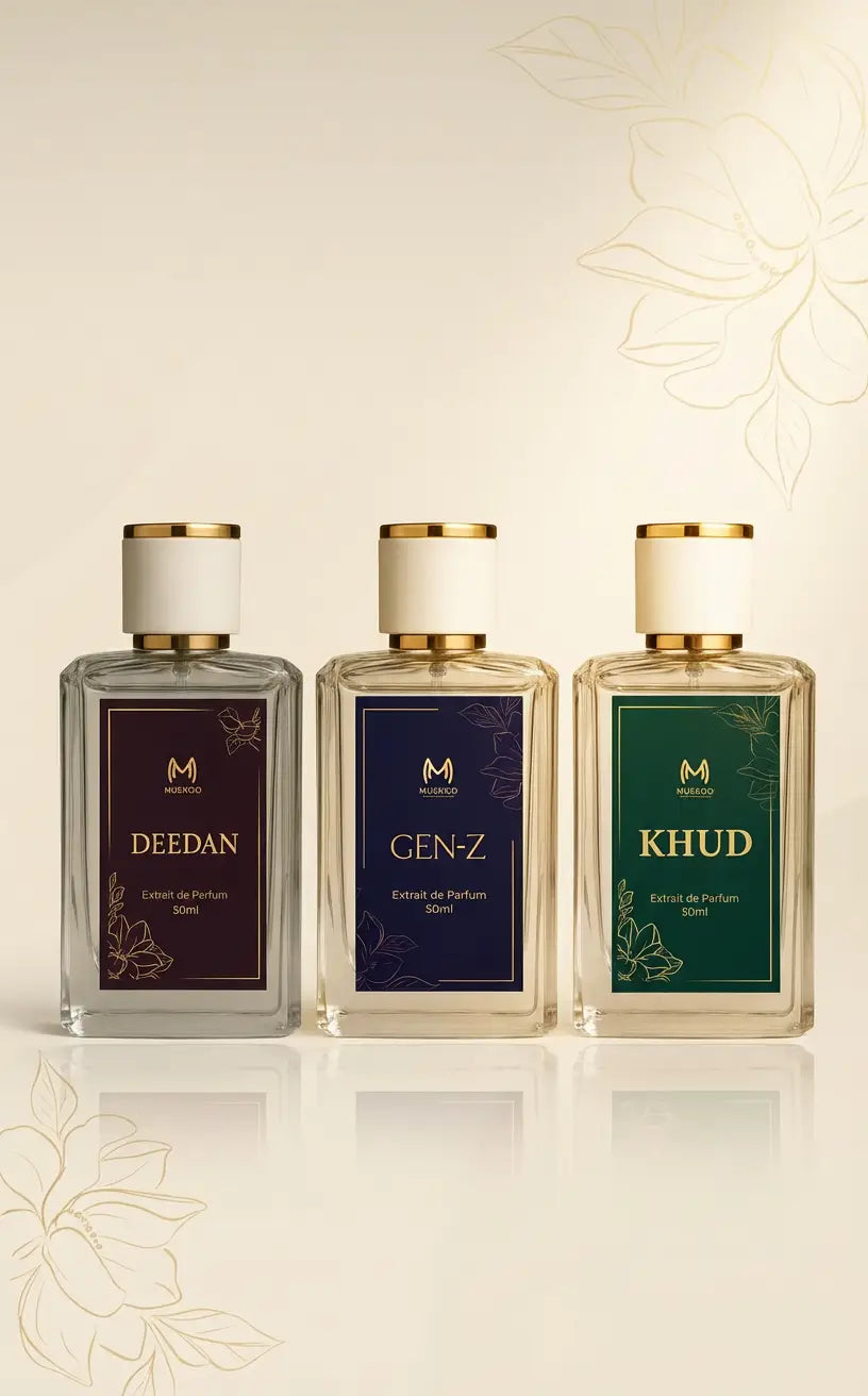 Three 50ml perfume bottles labeled Deedan, Gen-Z, and Khud with gold and white caps on a beige floral background
